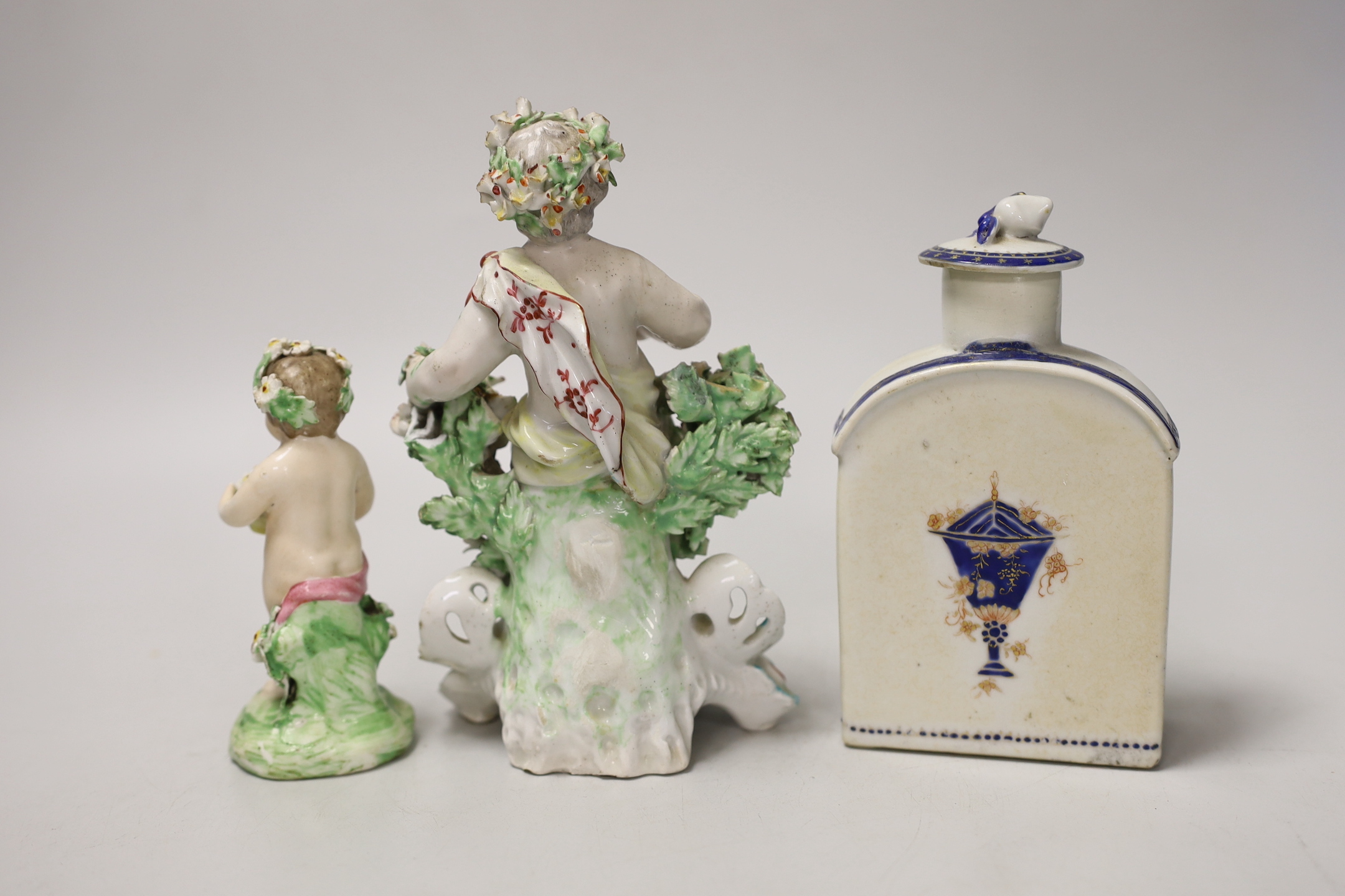 Two late 18th century Derby figures of cherubs and a Chinese Export porcelain caddie and cover